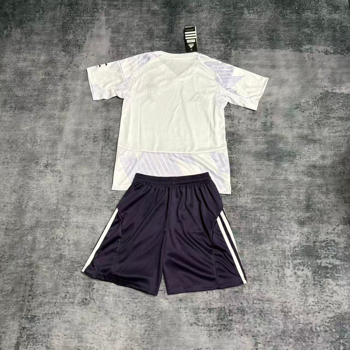 Kit infantil Manchester United Away 25/26 - Branca