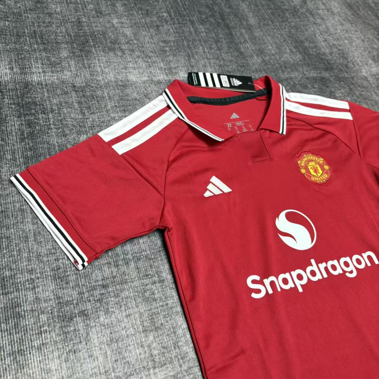 Kit infantil Manchester United Home 26/27  - Vermelho