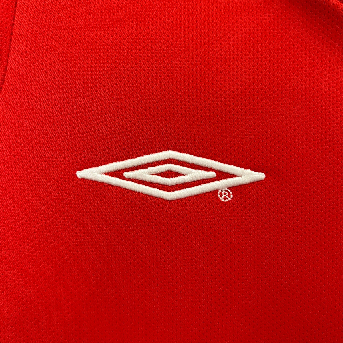 Kit infantil Manchester United Retrô Home 2000 . - Vermelho