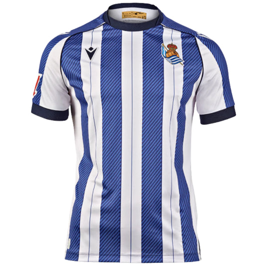 Real Sociedad Home 25/26 Torcedor Macron  - Azul e Branco